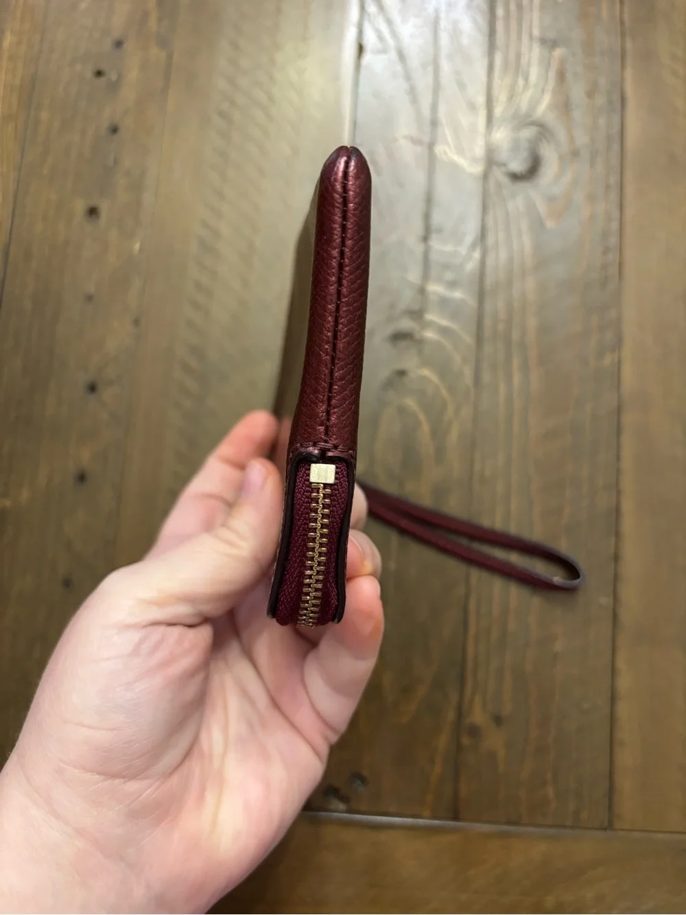 Coach Pebbled Leather Wristlet in Metallic Burgundy